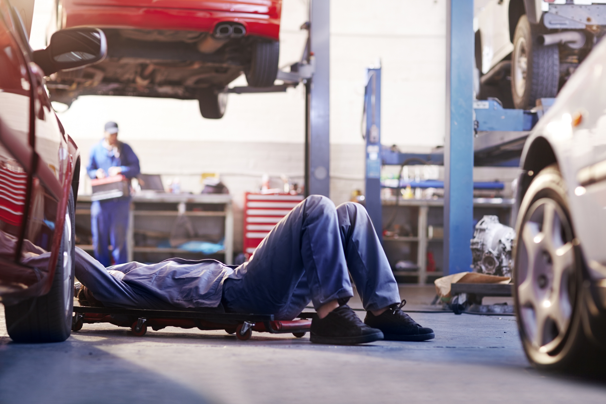 The HiWay Auto Collision Center shop floor with technicians at work